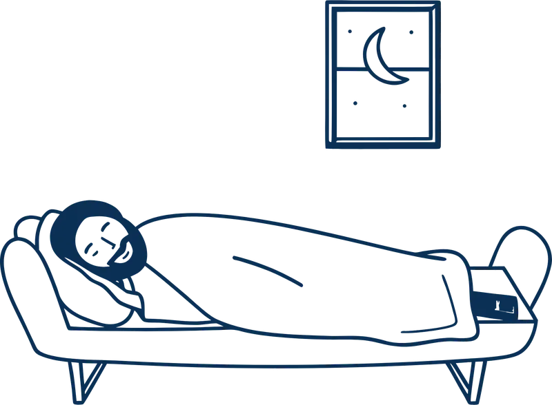 A man resting on a sofa, his phone on the table