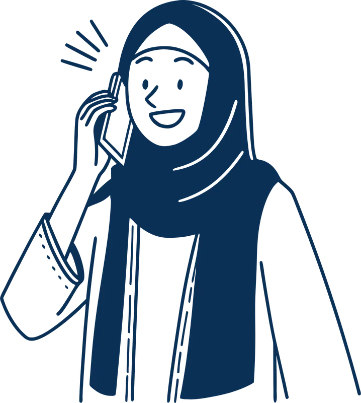A woman in a shayla smiling on a phone call